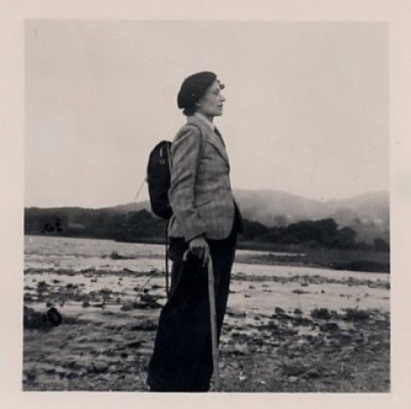 Joanna Cannan standing on the shore of a loch